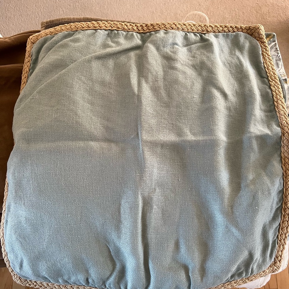 3 potterybarn pillow covers, washed, 2 of the floral, one of the solid